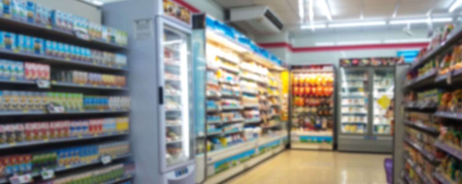 Convenience stores and newsagents insurance: Food and drink aisles within a shop. 